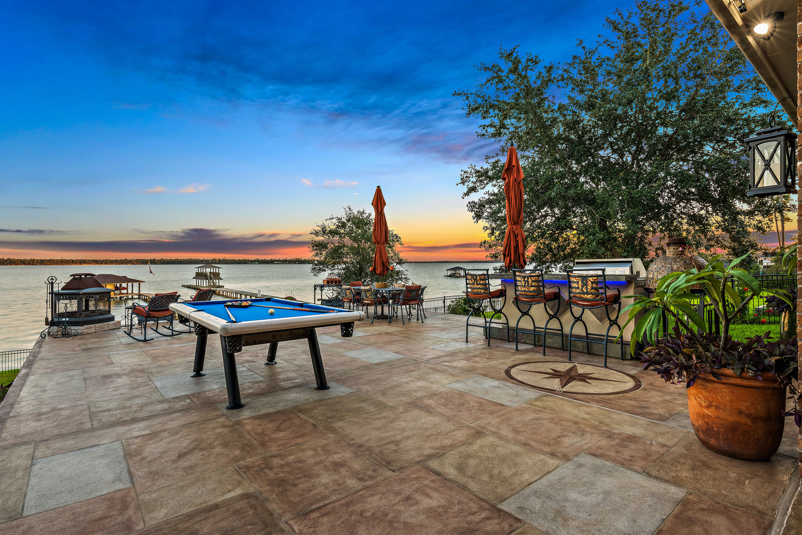 Carvestone pool deck backyard goals lake view in Conroe Texas