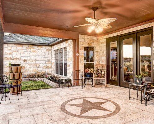 Carvestone covered patio and deck that is an alternative to pavers