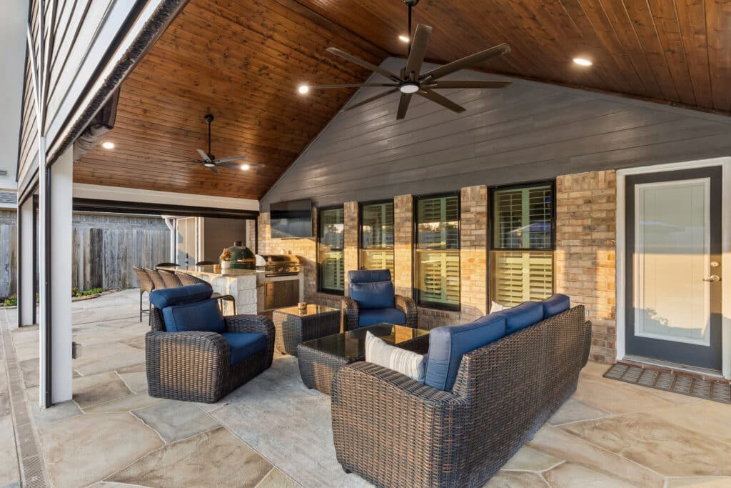 Custom patio with outdoor seating and pool deck area