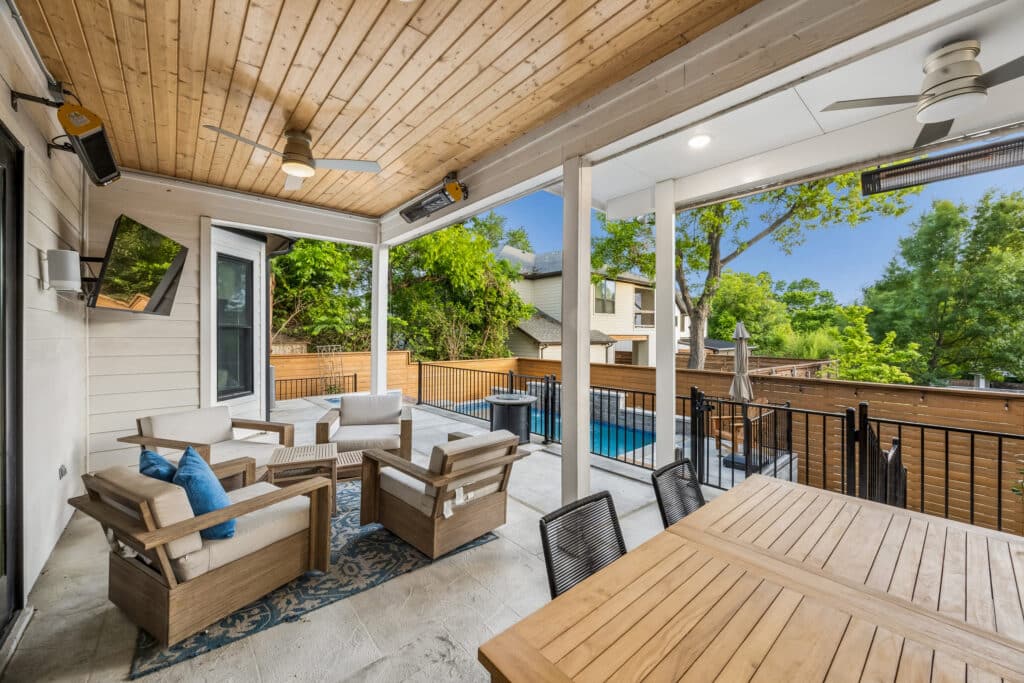 Covered patio and pool deck designed for outdoor living