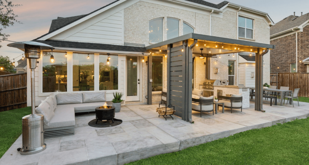 Backyard patio concrete design with covered pergola and outdoor living space