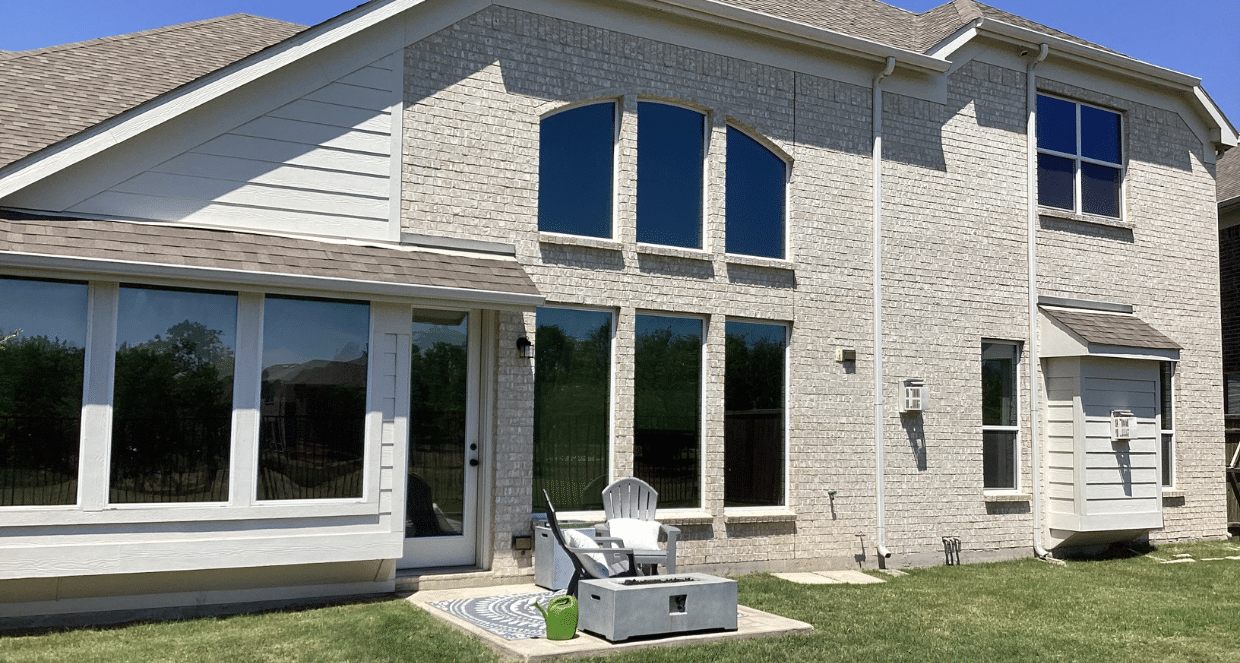 Backyard patio concrete design with covered pergola and outdoor living space