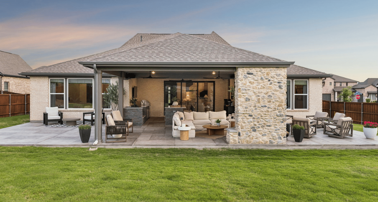 Backyard after covered patio and outdoor living space renovation