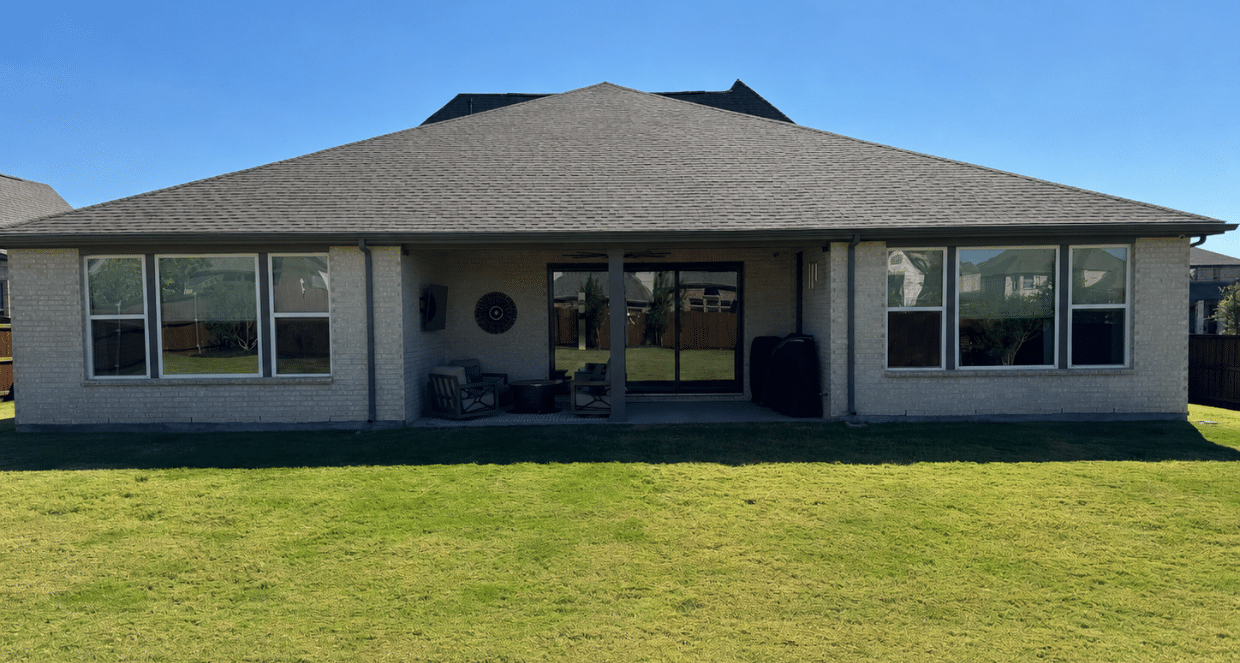 Backyard before outdoor living and covered patio renovation