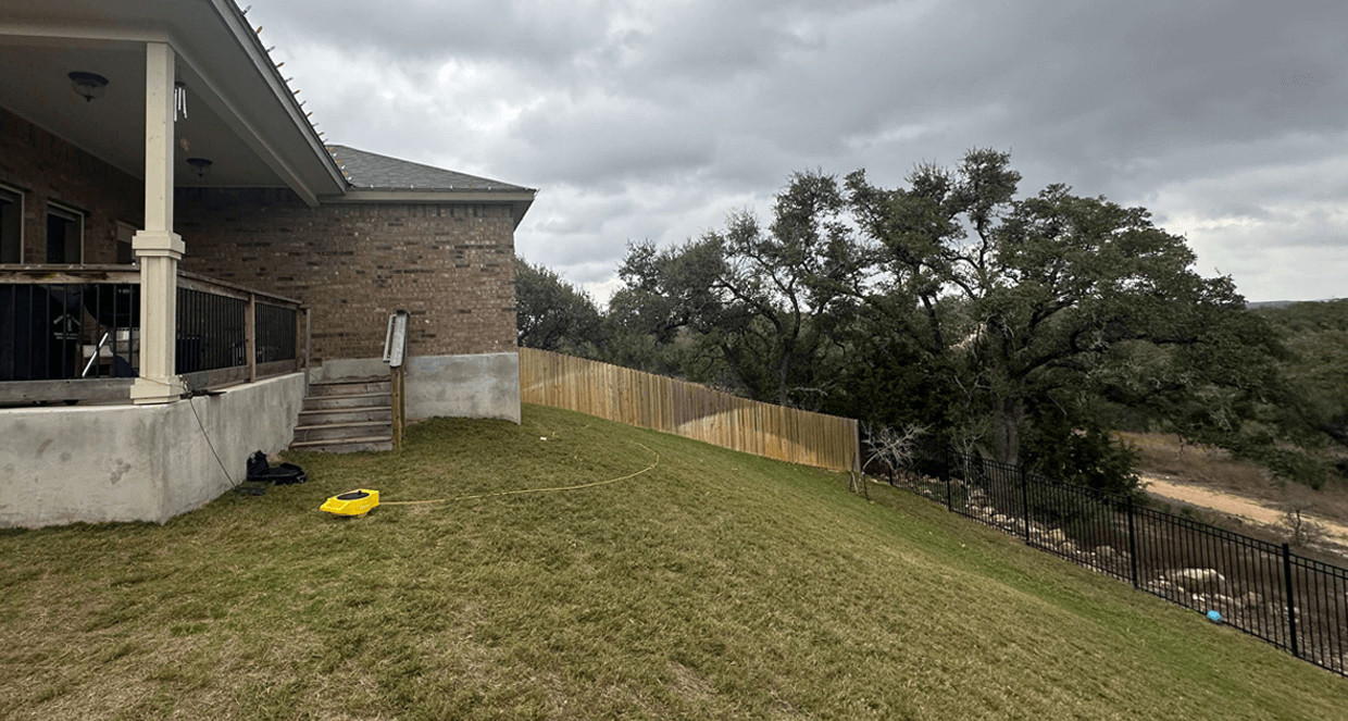 Before view of backyard before covered patio update