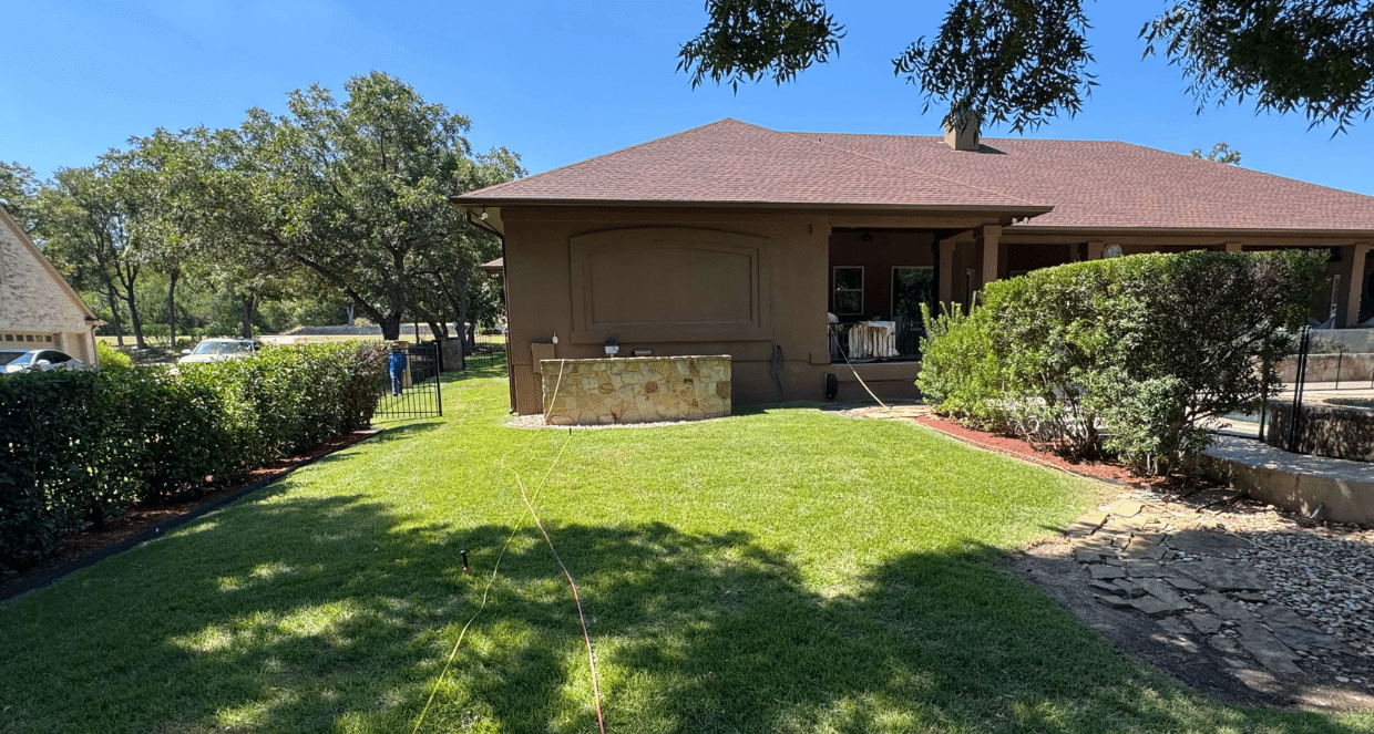 Before and after backyard patio project with lawn and covered space