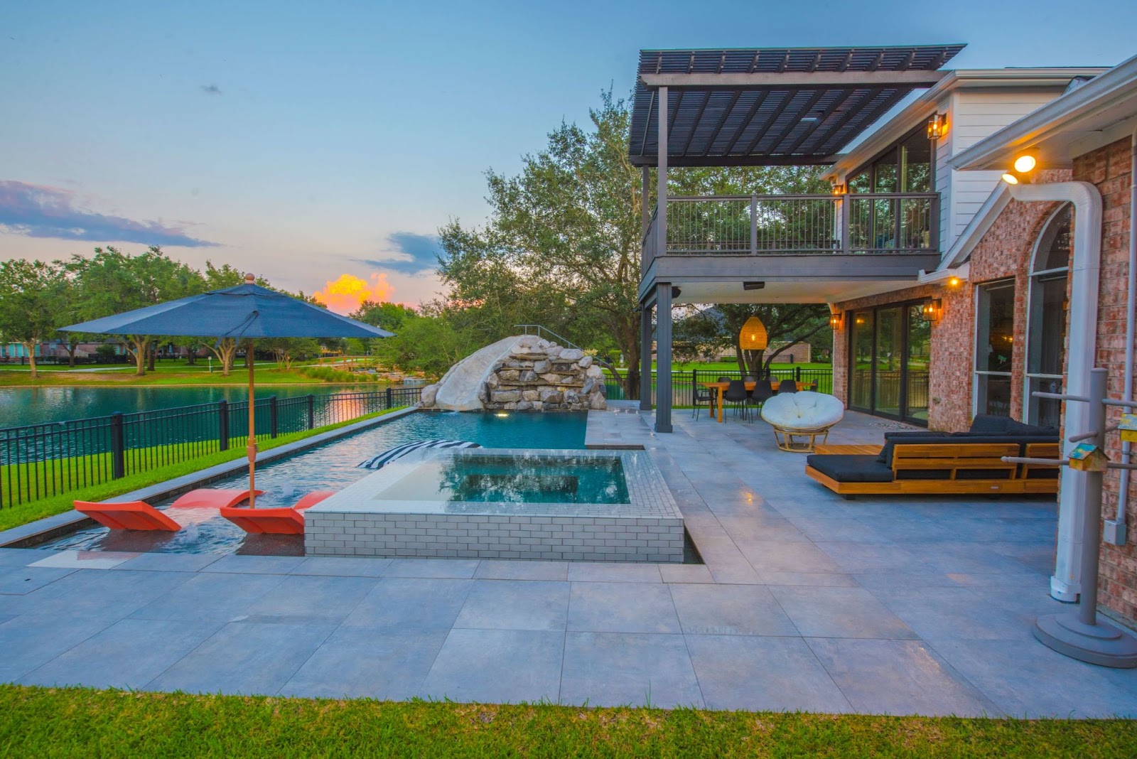 texas swimming pool refinishing with gray porcelain tile pool deck