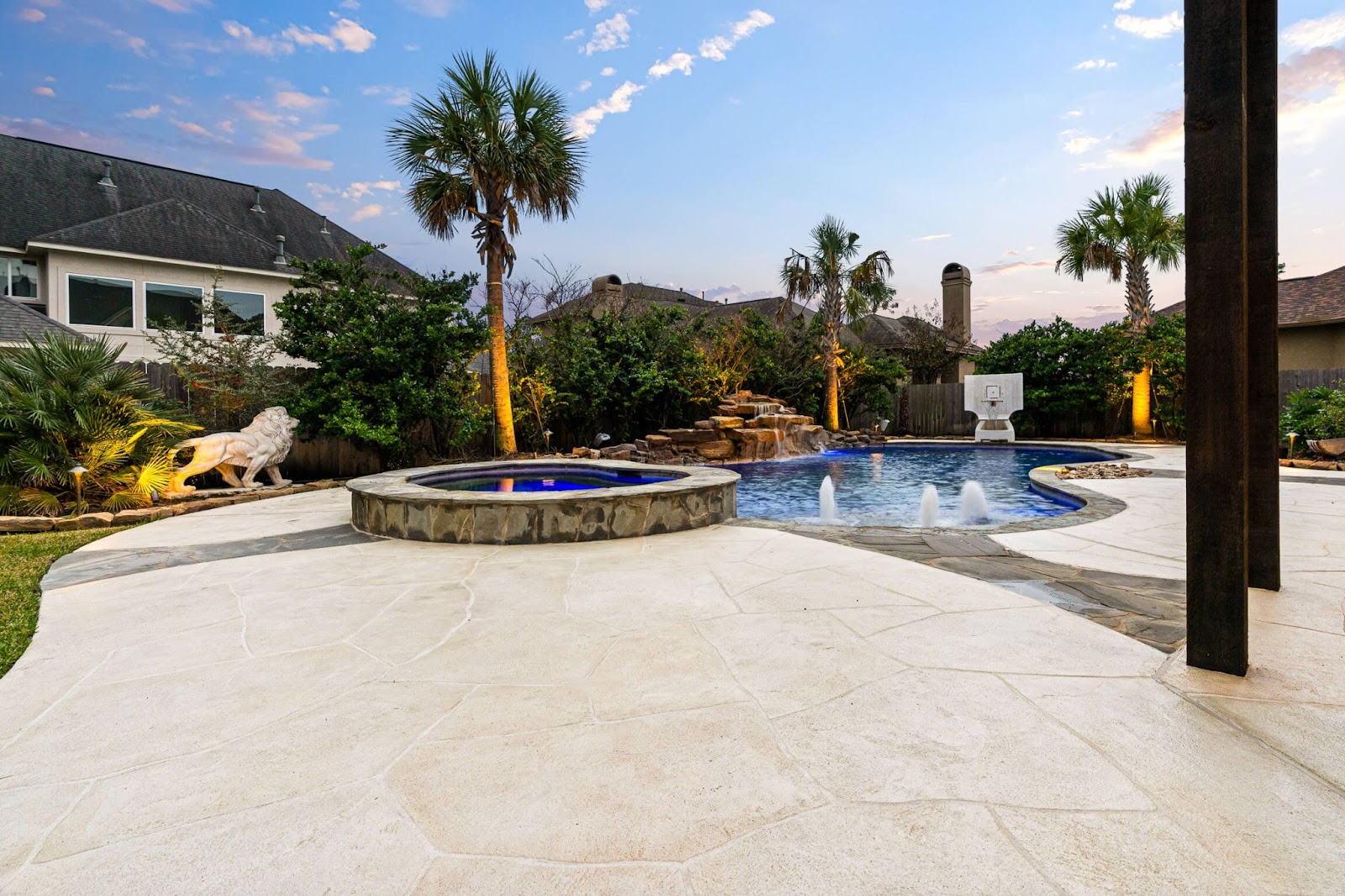 custom rock waterfall and inground pool renovation texas