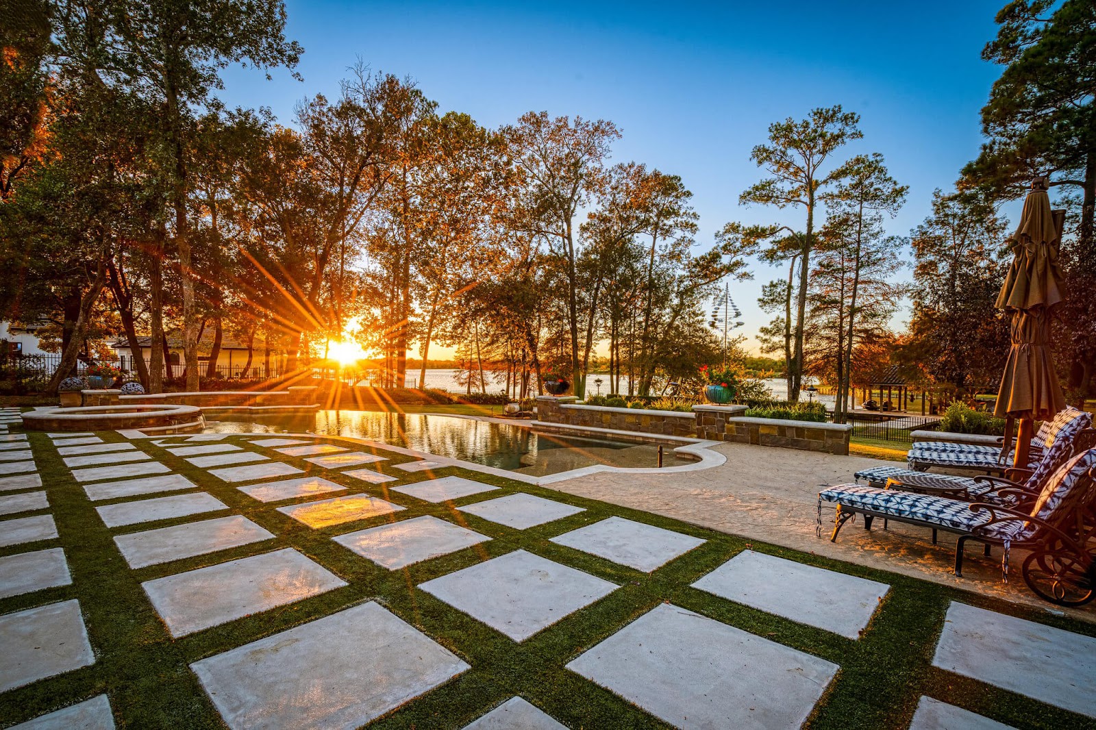 beautiful outdoor concrete turf patio and pool deck in tx