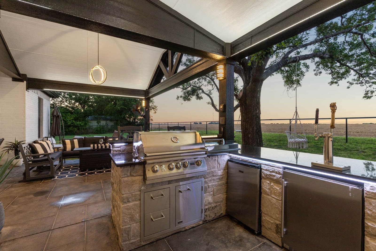 premium home outdoor bar with wine fridge, grill, keg draft system and ice maker