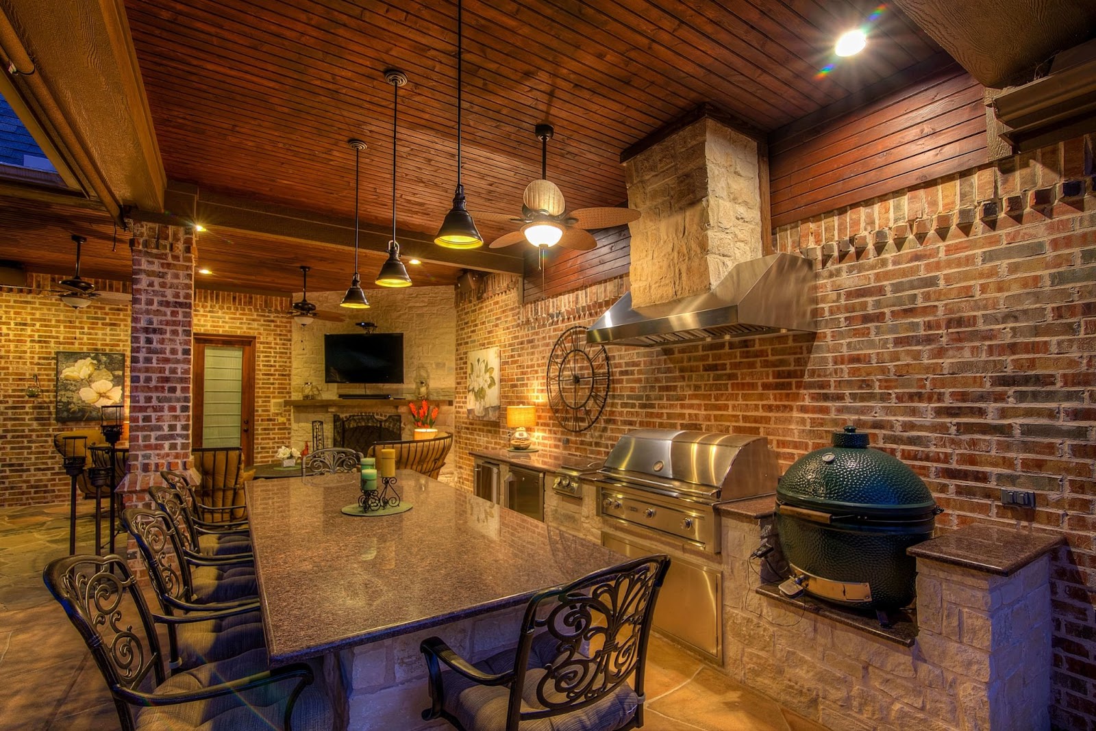 backyard renovation ROI with custom outdoor kitchen and covered patio design features