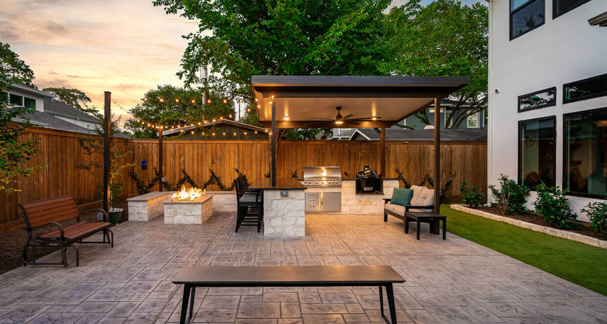 backyard kitchen and custom fire pit with covered pergola, texas