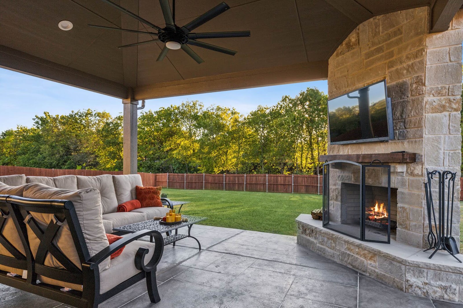 dallas covered patio extension with fireplace and seating, allied outdoor solutions