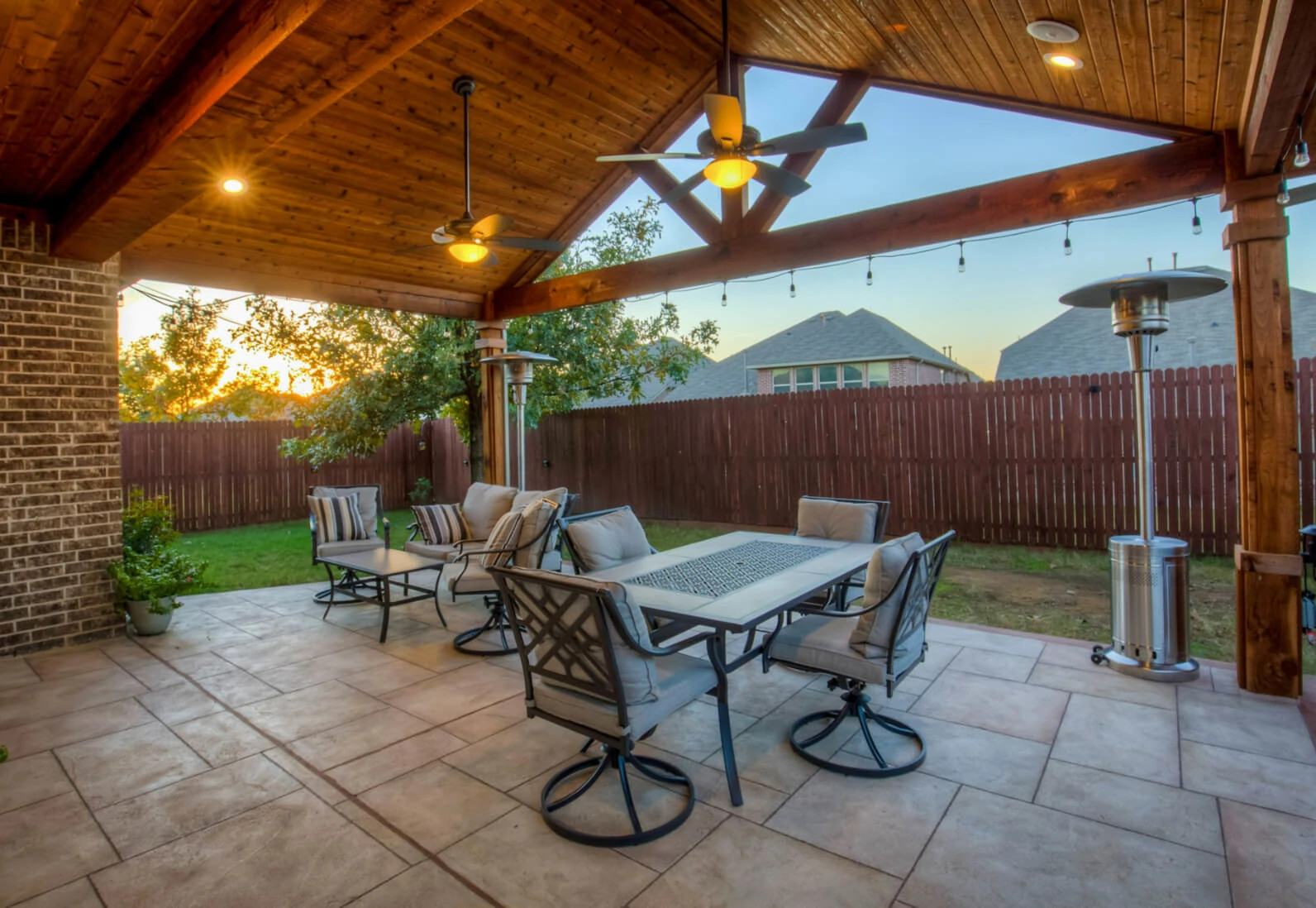 texas outdoor living space, covered patio extension with gable roof and dining area