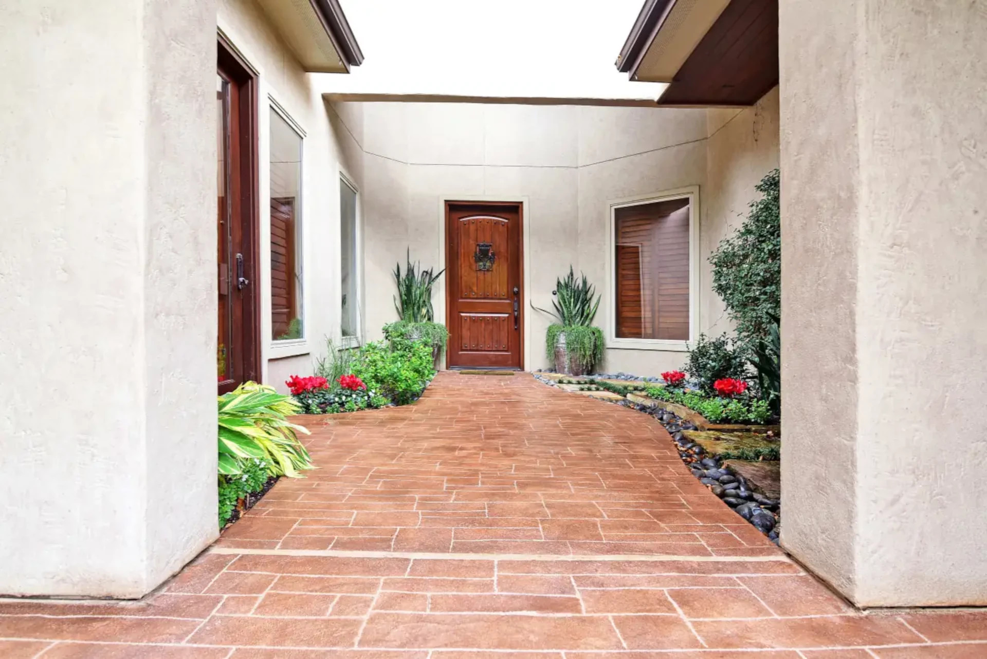 carvestone walkway pavers, modified concrete with terra cotta color