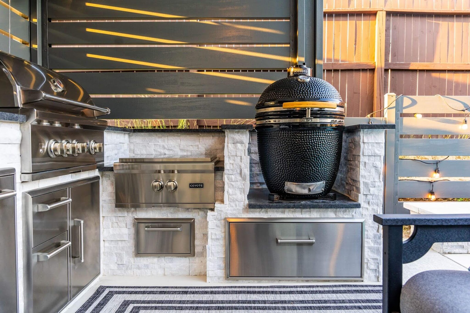 backyard grill island with big green egg and custom range insert