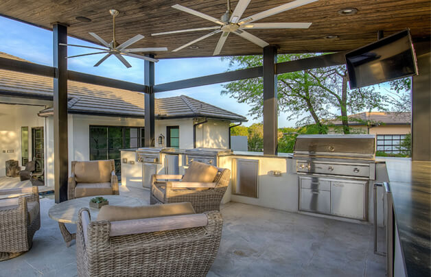 handcrafted outdoor grill island with stucco finish, texas