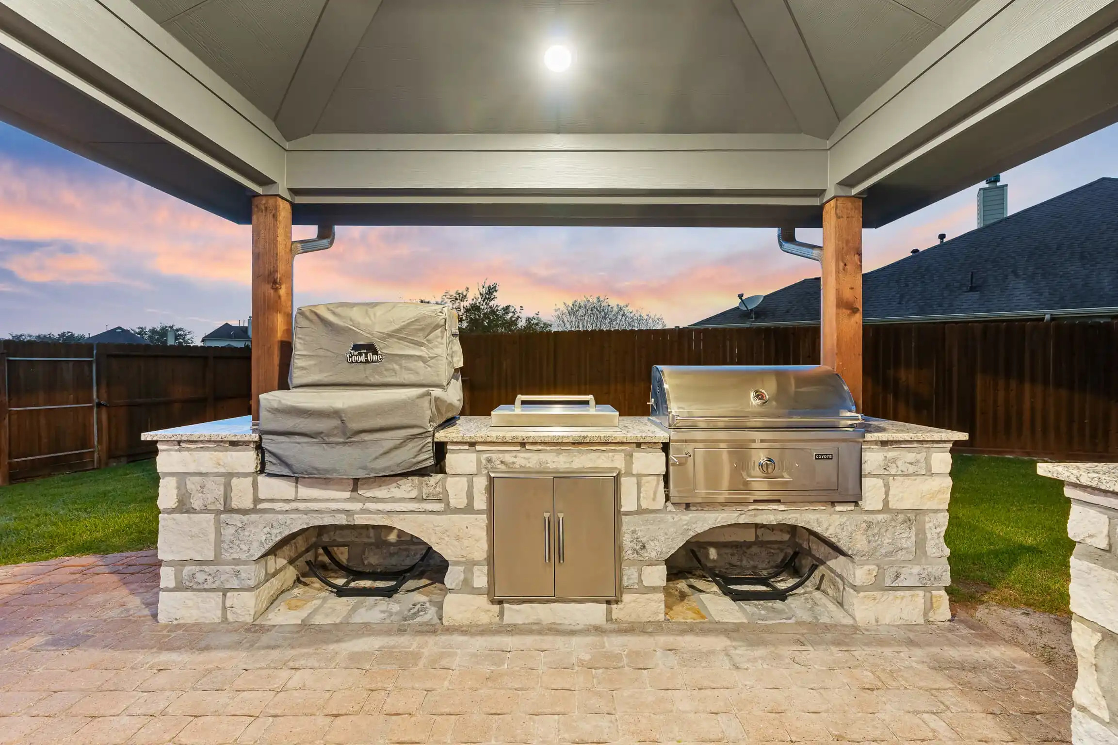 outdoor grill island with dual stainless steel grills, texas outdoor living space