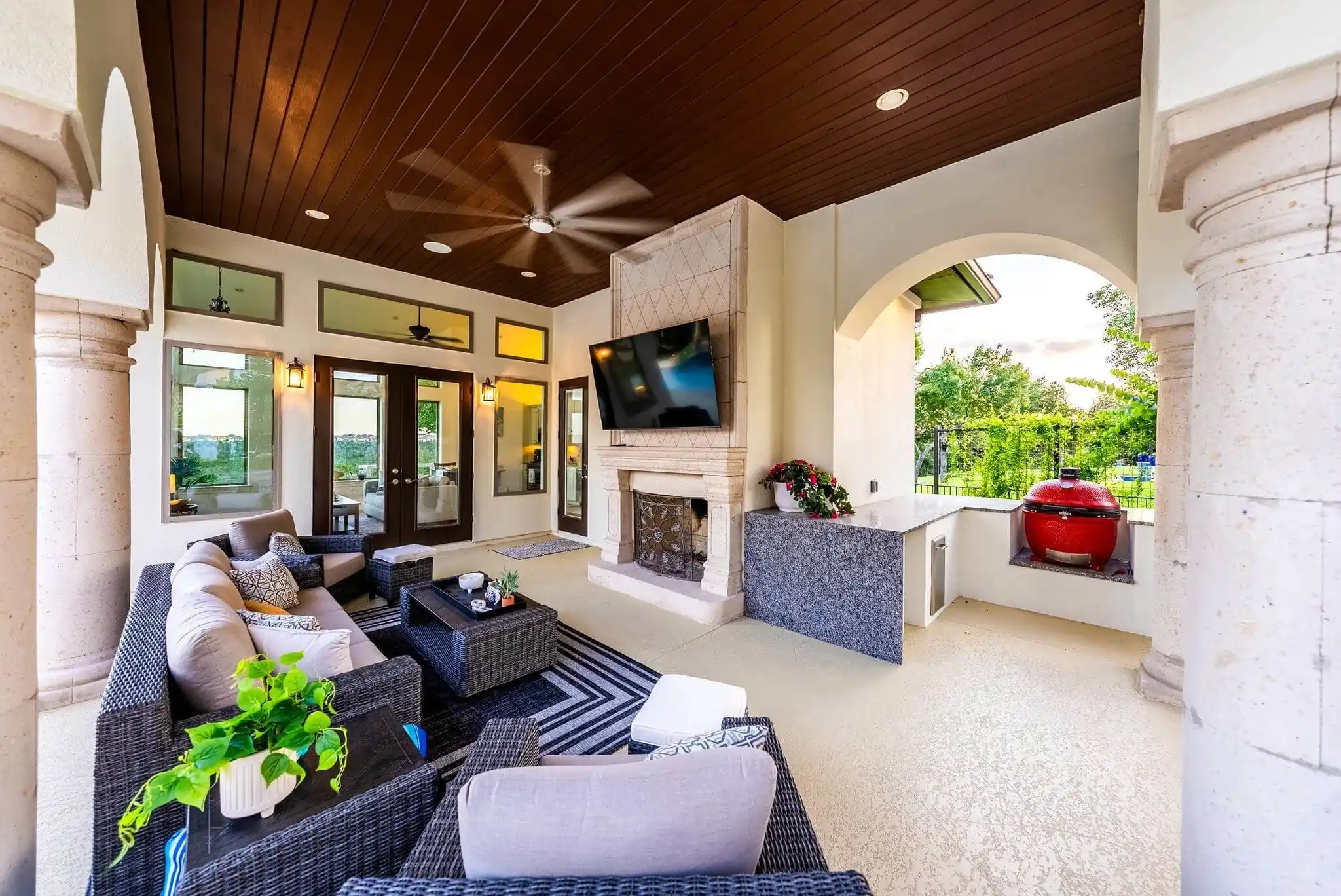 indoor outdoor living room with fireplace, grill and furniture, allied outdoor solutions