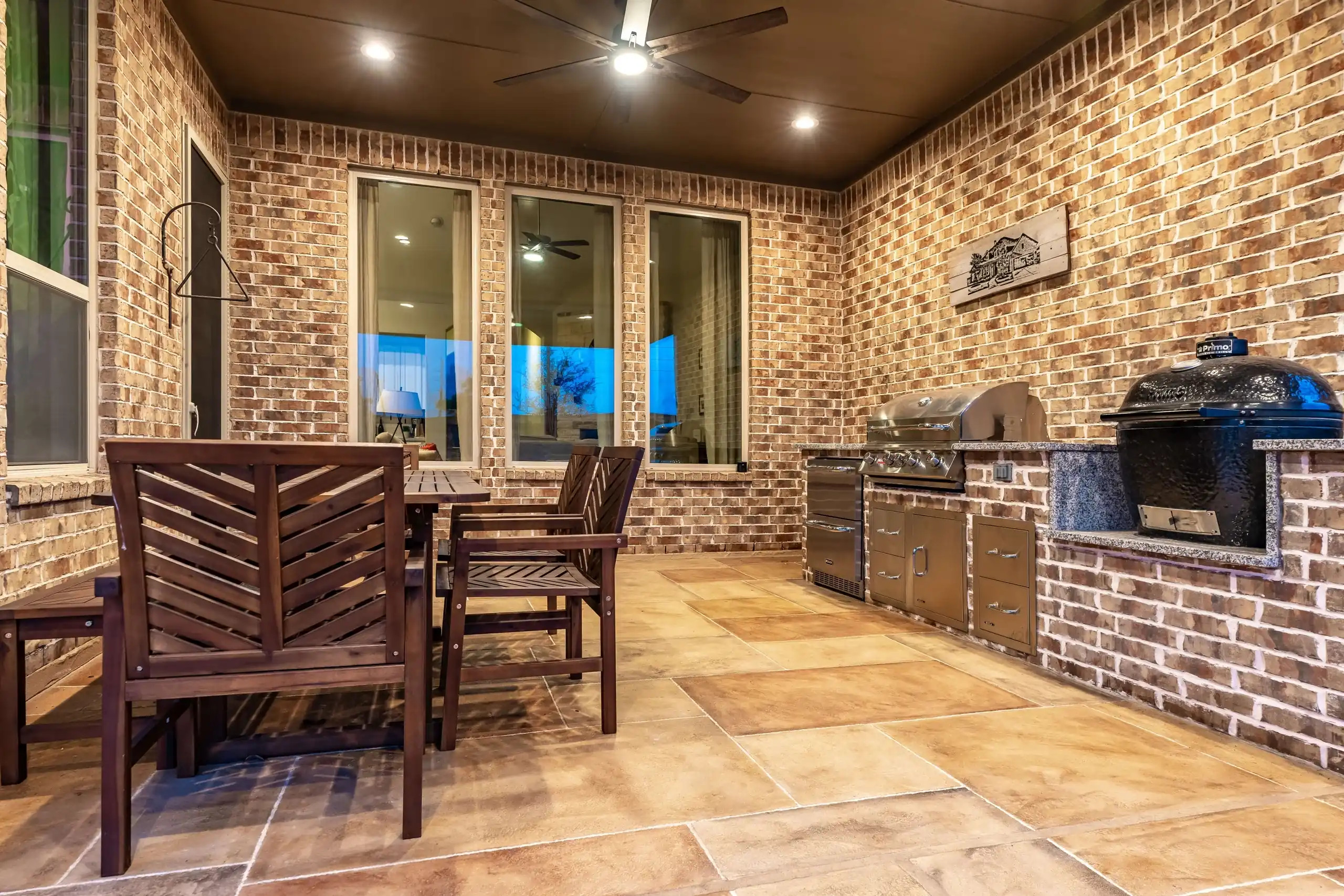 brick outdoor kitchen and grill station with dining area, allied outdoor solutions