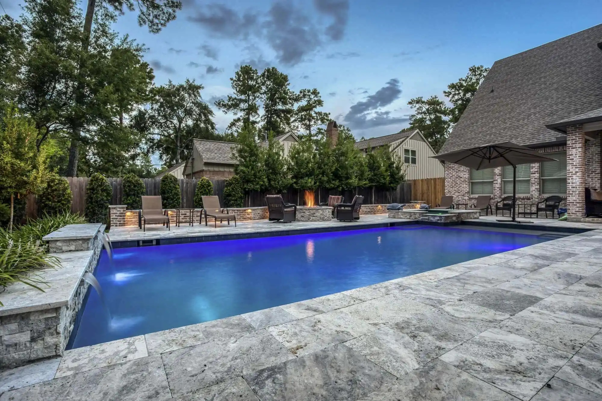 gray travertine pavers in pool deck design, san antonio, texas