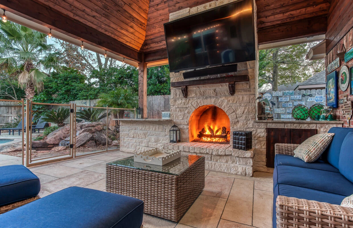 texas outdoor living room with integrated outdoor tv and fireplace, allied outdoor solutions