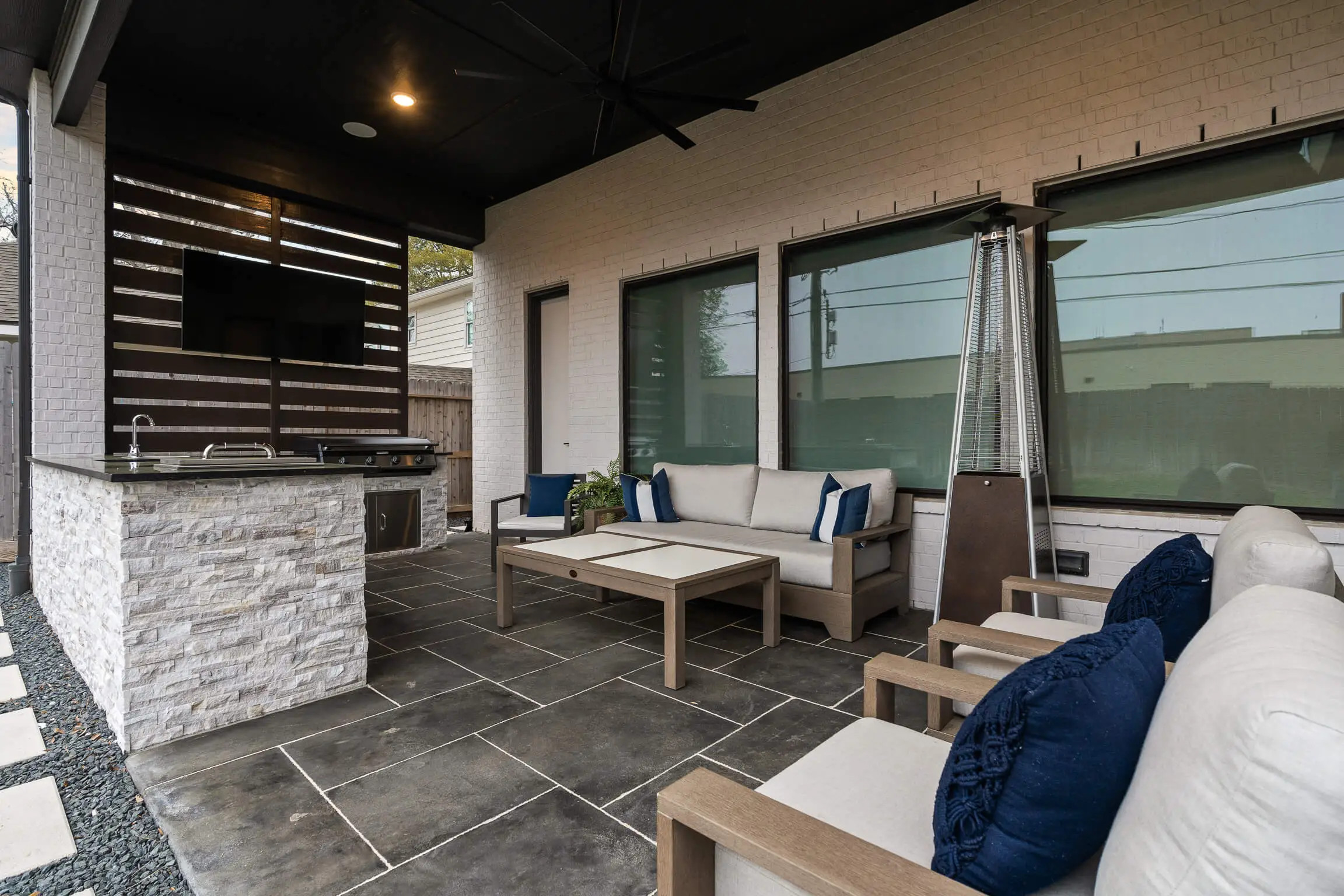 attached small patio design with entertainment space and furniture, allied outdoor solutions