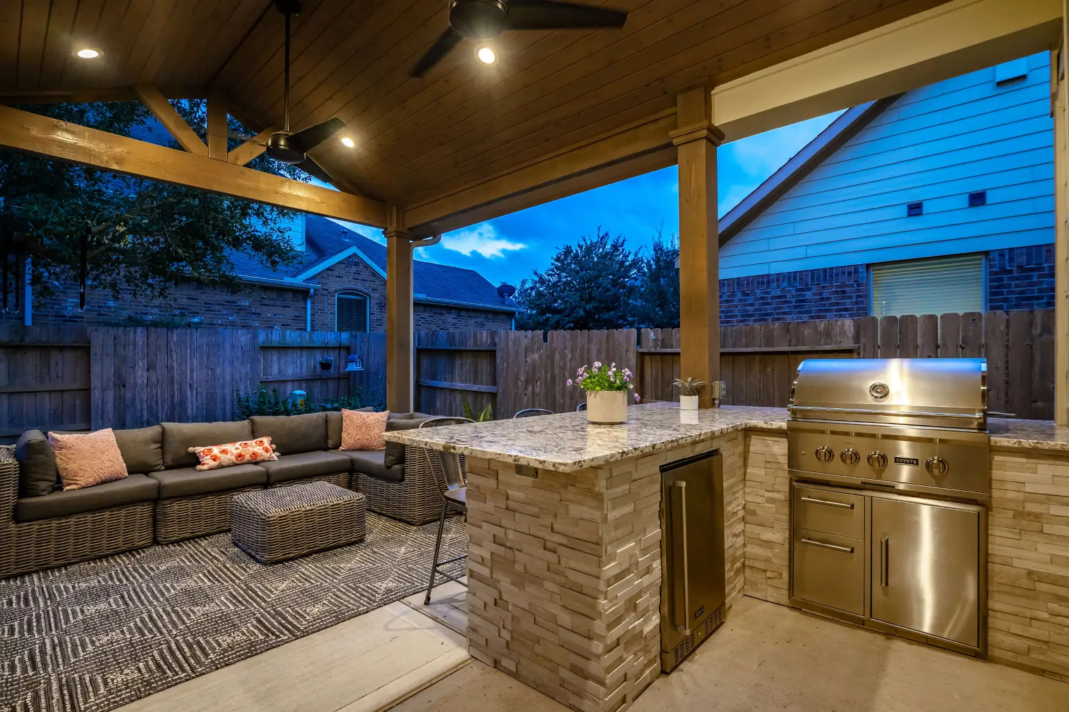 small backyard patio with outdoor grill island and outdoor living room features