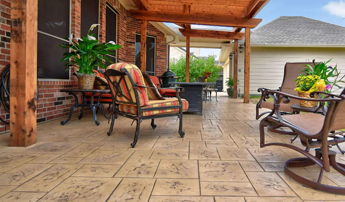 stamped concrete decorative concrete patio in texas backyard, allied outdoor solutions